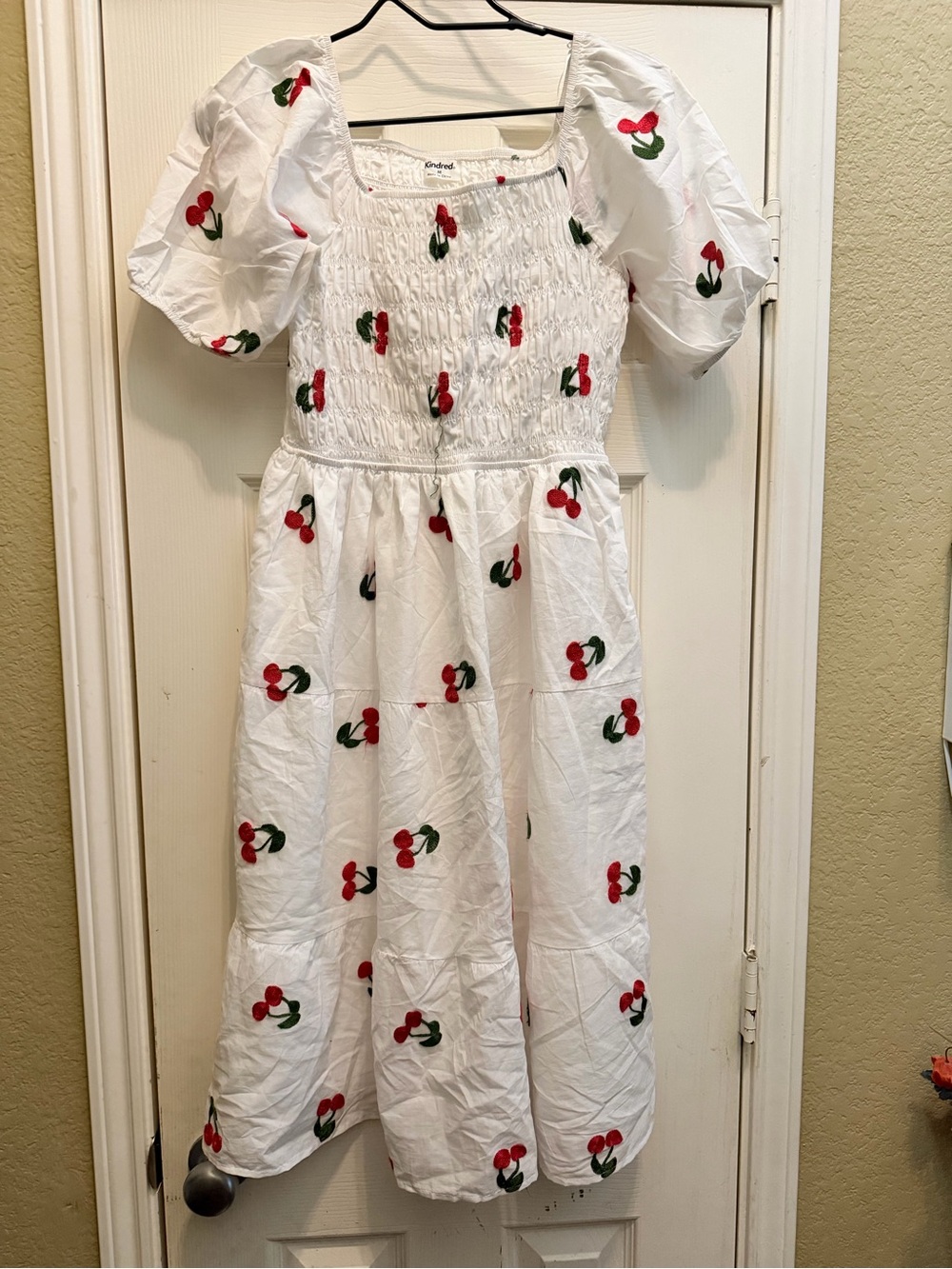 Kindred puffed sleeve smocked dress with cherry embroidery
